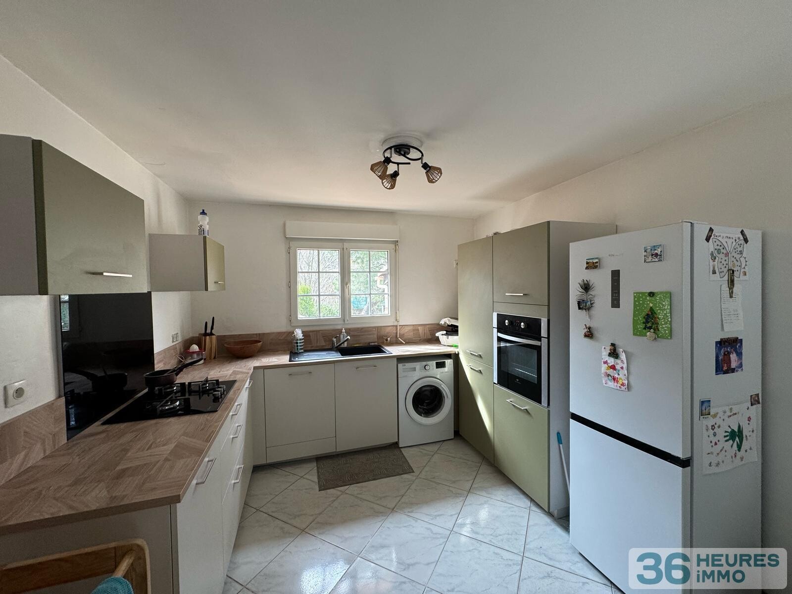 Maison de plain-pied avec beau terrain attenant 