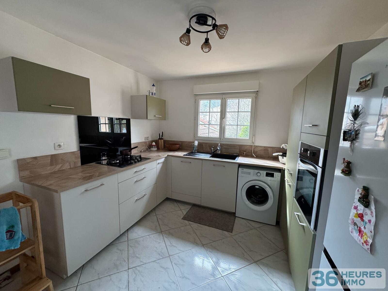 Maison de plain-pied avec beau terrain attenant 