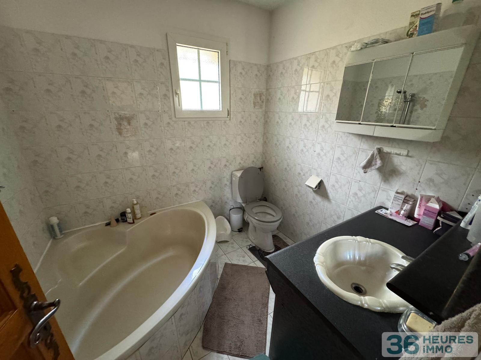 Maison de plain-pied avec beau terrain attenant 