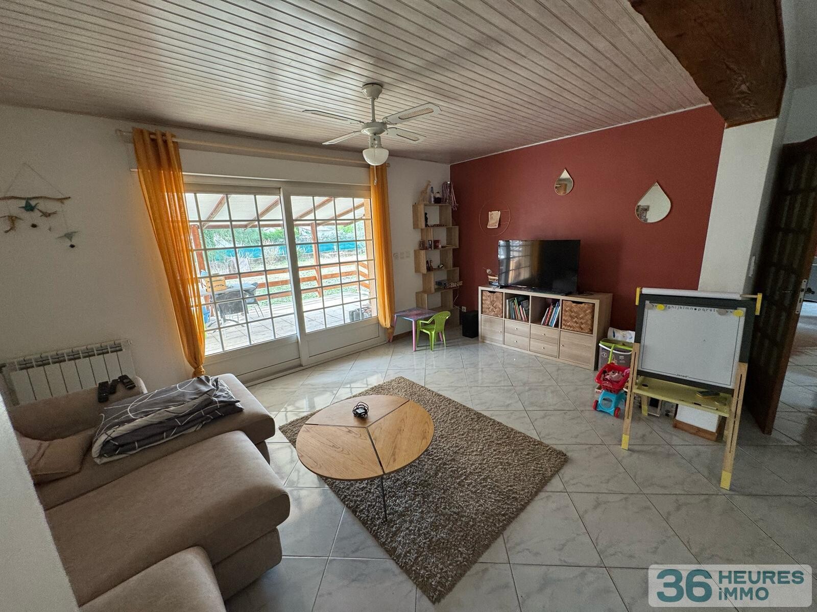 Maison de plain-pied avec beau terrain attenant 