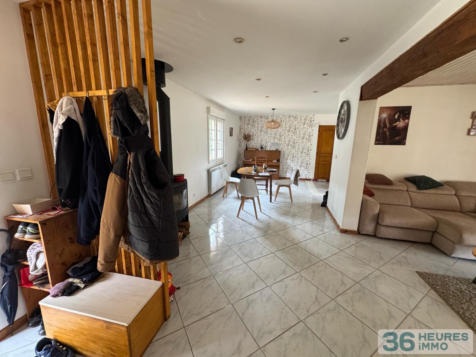 Maison de plain-pied avec beau terrain attenant 