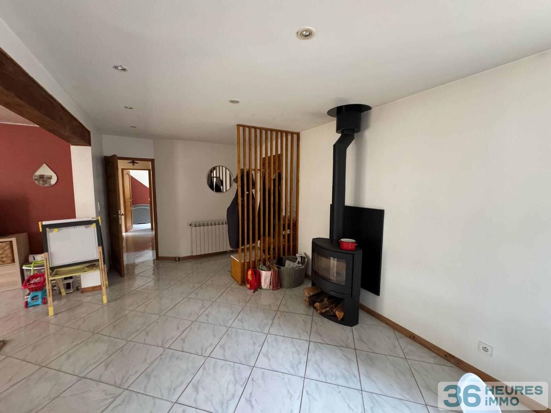 Maison de plain-pied avec beau terrain attenant 