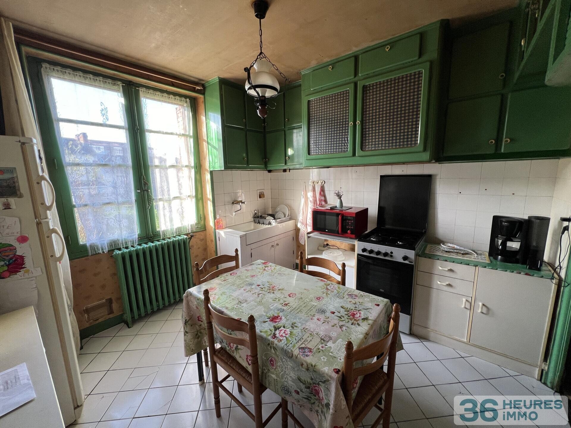 MAISON SUR SOUS SOL AVEC JARDIN