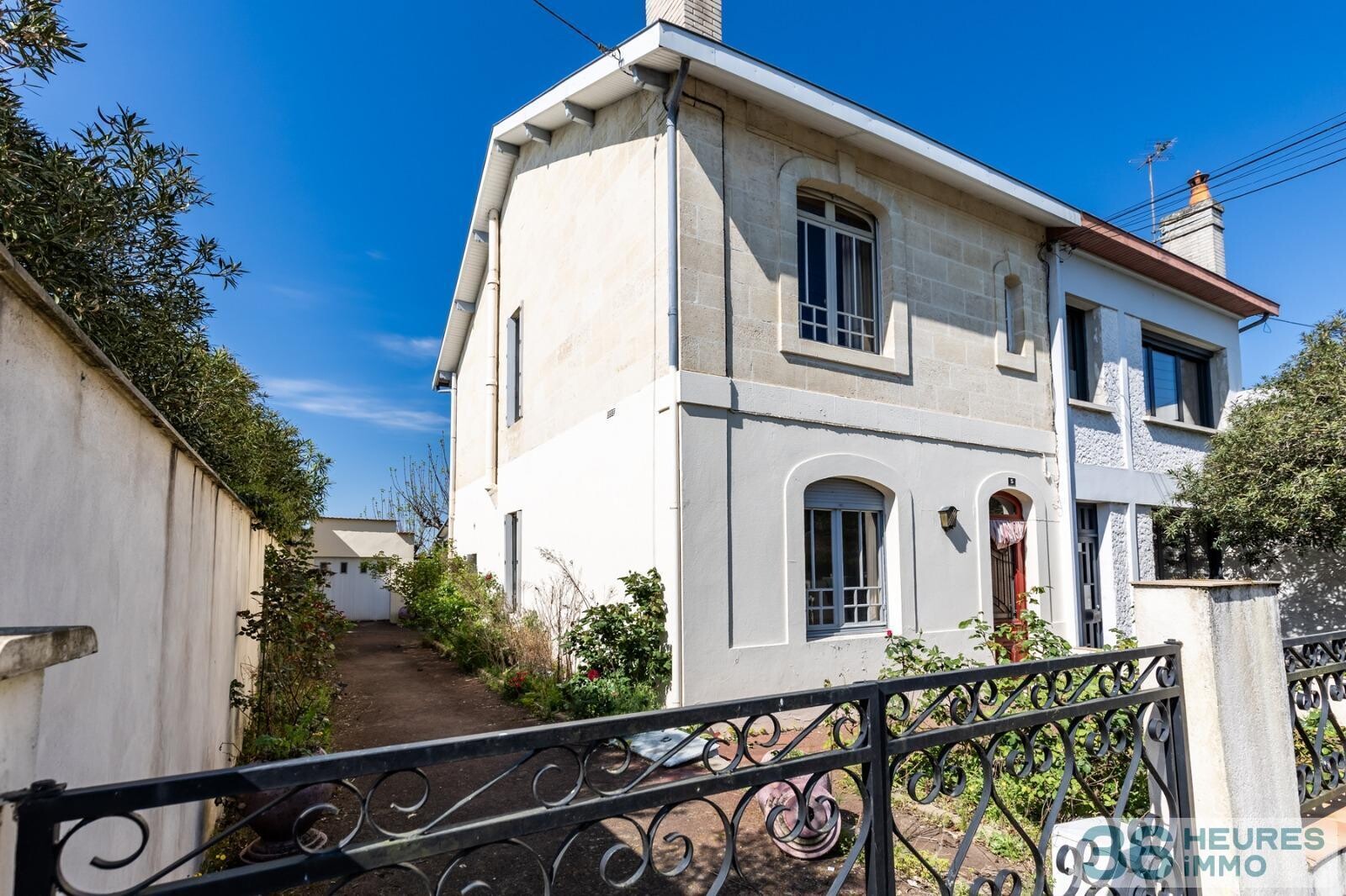 Maison pierre avec garage et jardin 