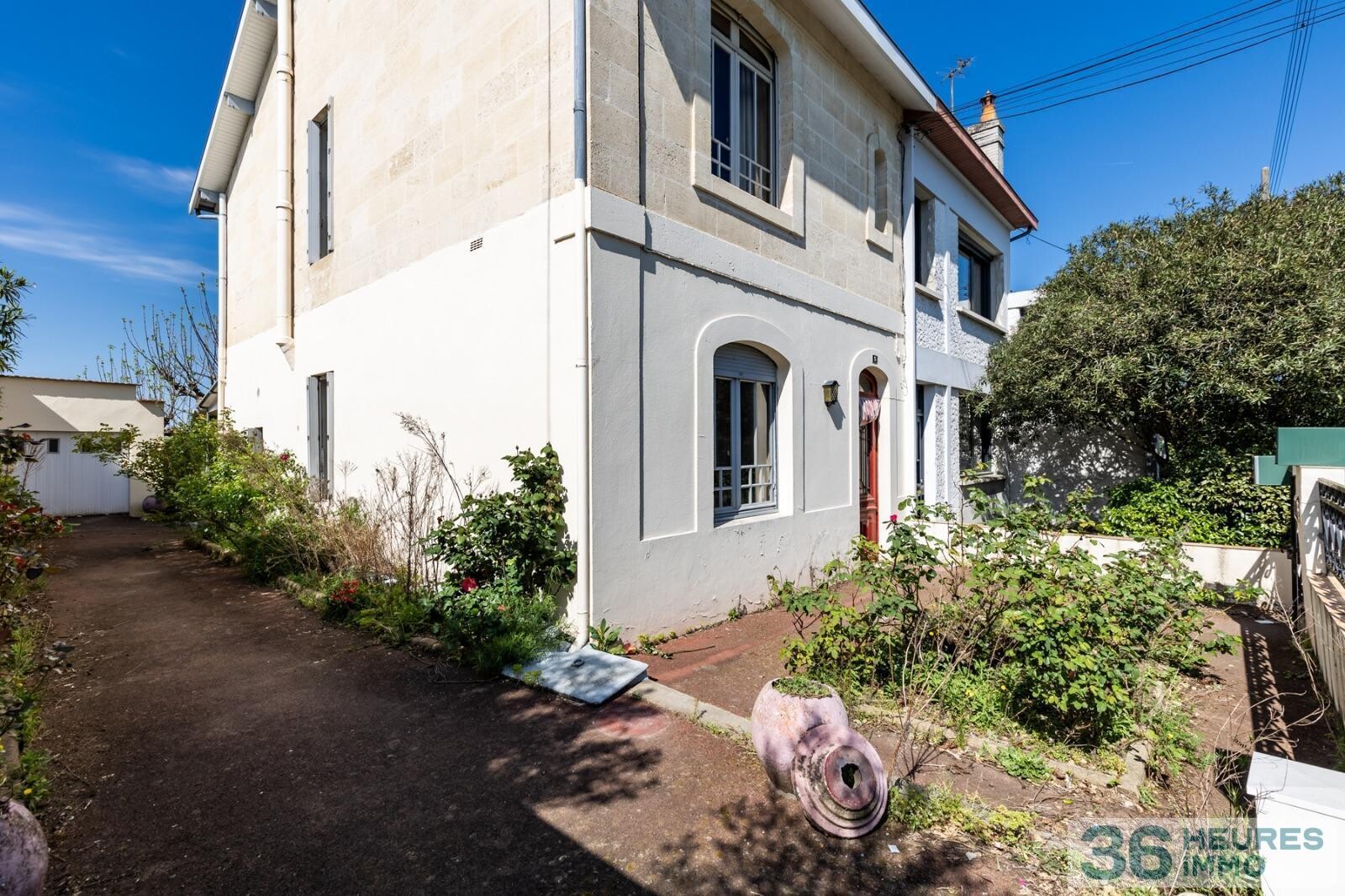 Maison pierre avec garage et jardin 
