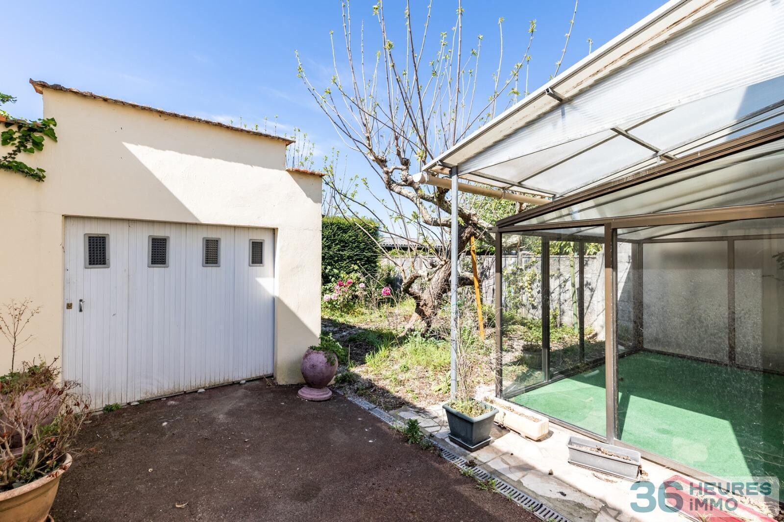 Maison pierre avec garage et jardin 