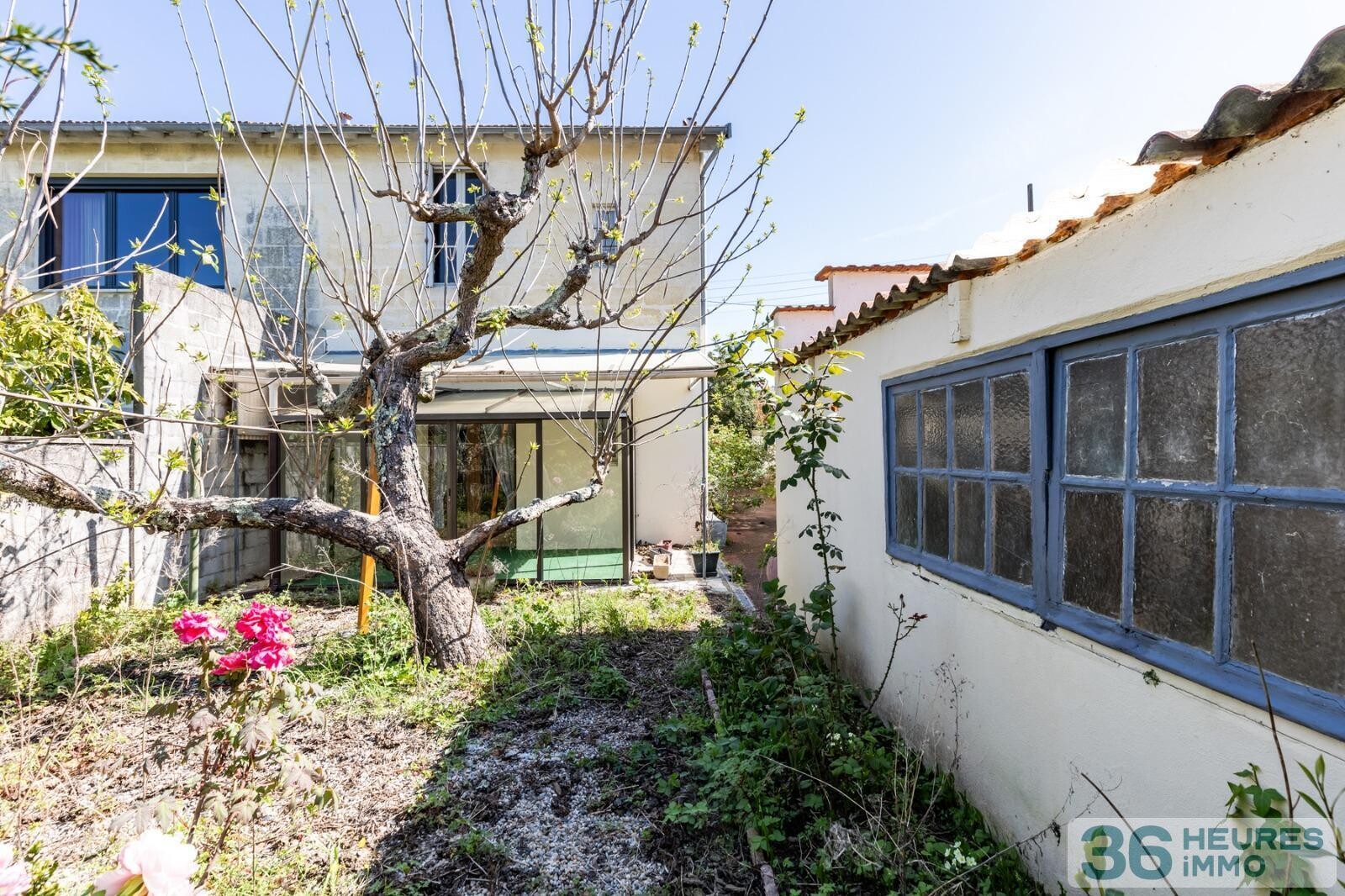 Maison pierre avec garage et jardin 