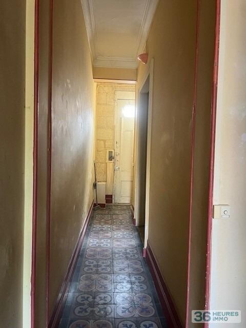 MAISON DE VILLE EN PIERRE AVEC JARDIN