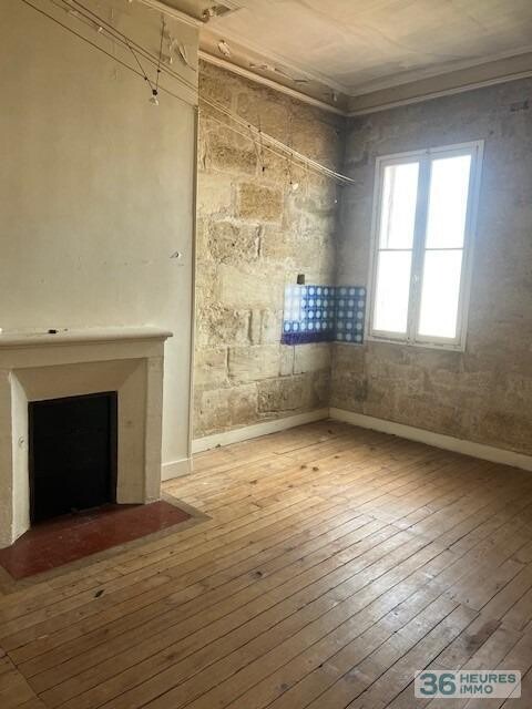 MAISON DE VILLE EN PIERRE AVEC JARDIN