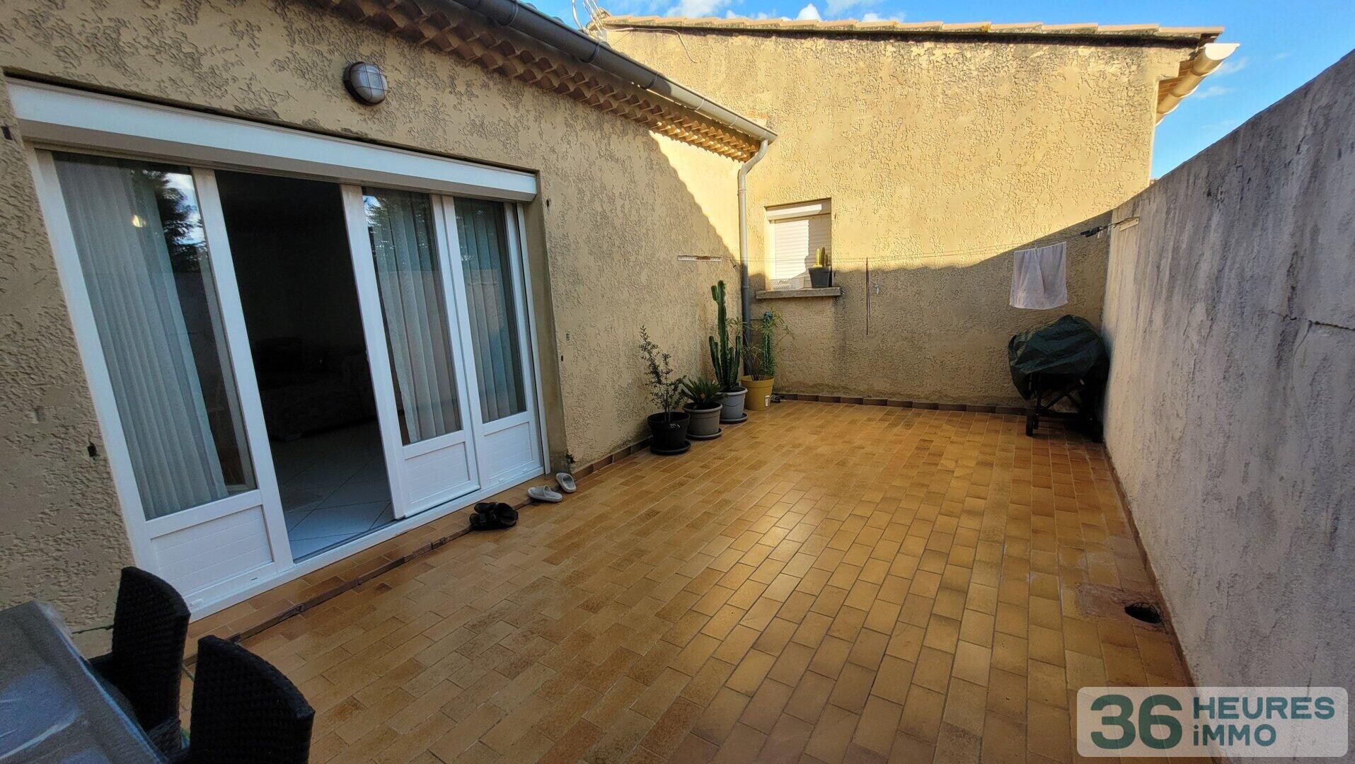 Grand appartement avec cour, parkings et garage