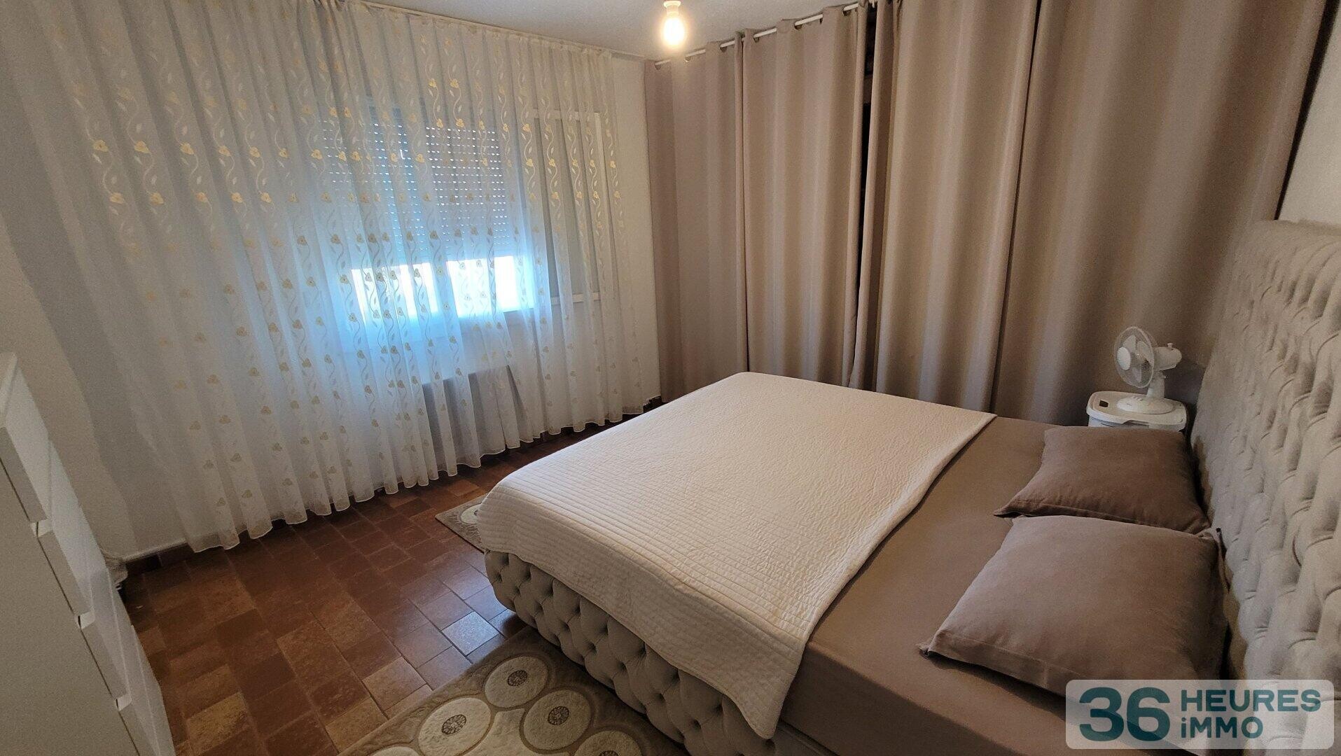 Grand appartement avec cour, parkings et garage