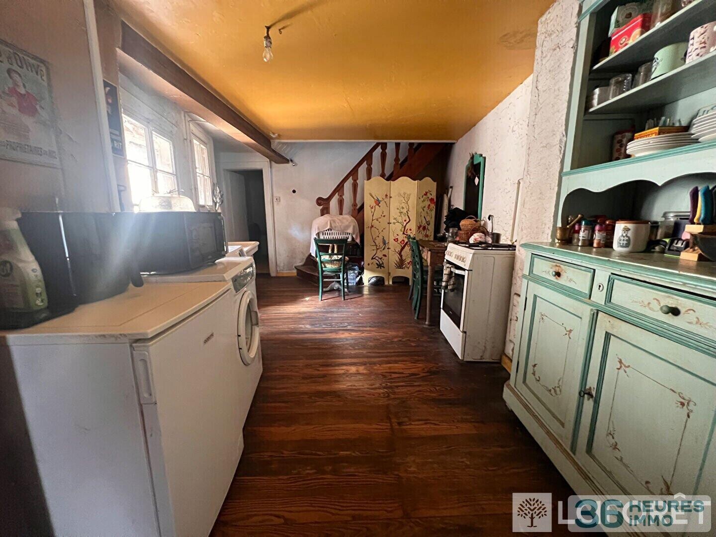 Maison de ville à grand potentiel - Grange et Jardin