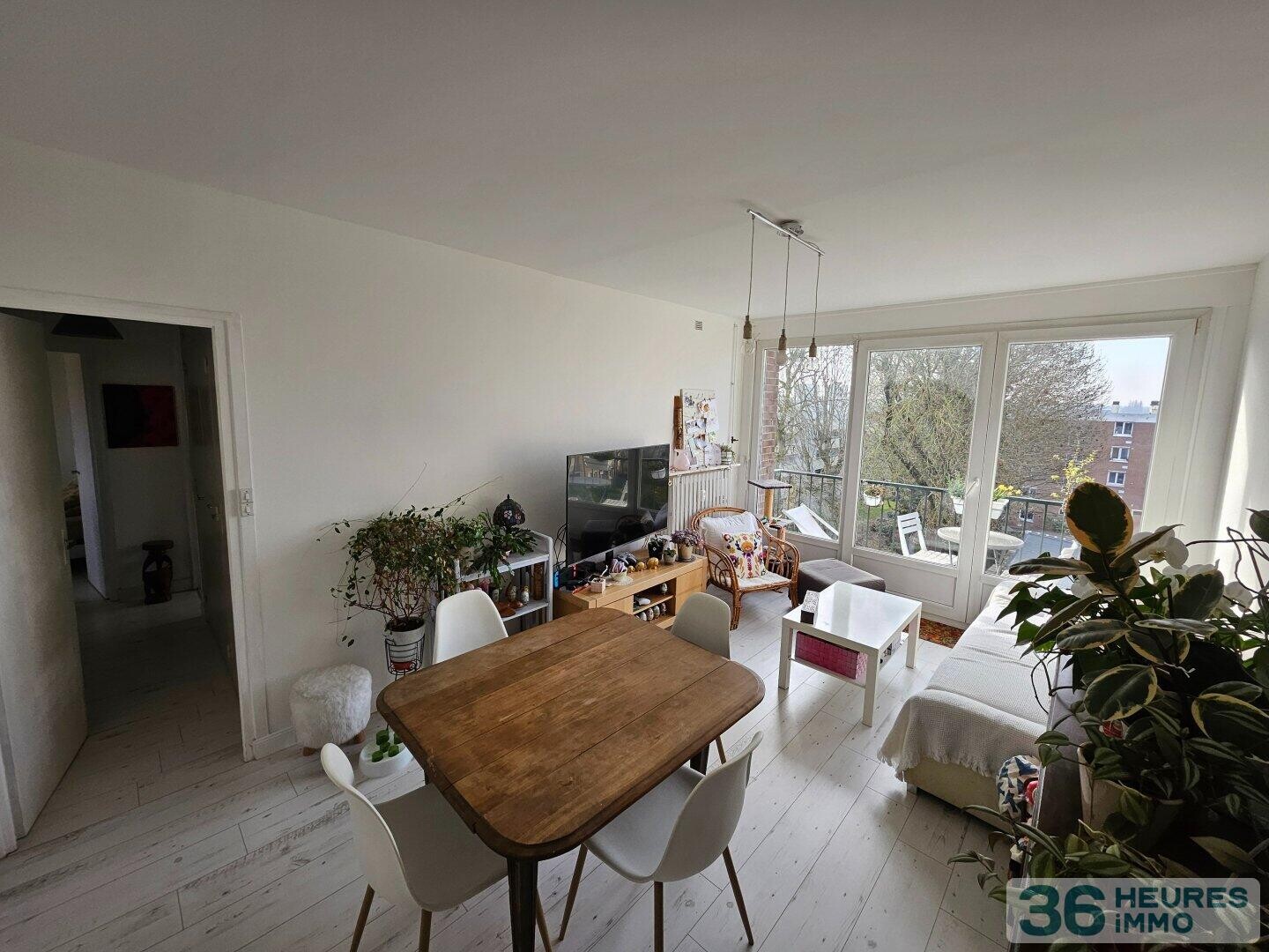 T4 avec Balcon, garage et parking