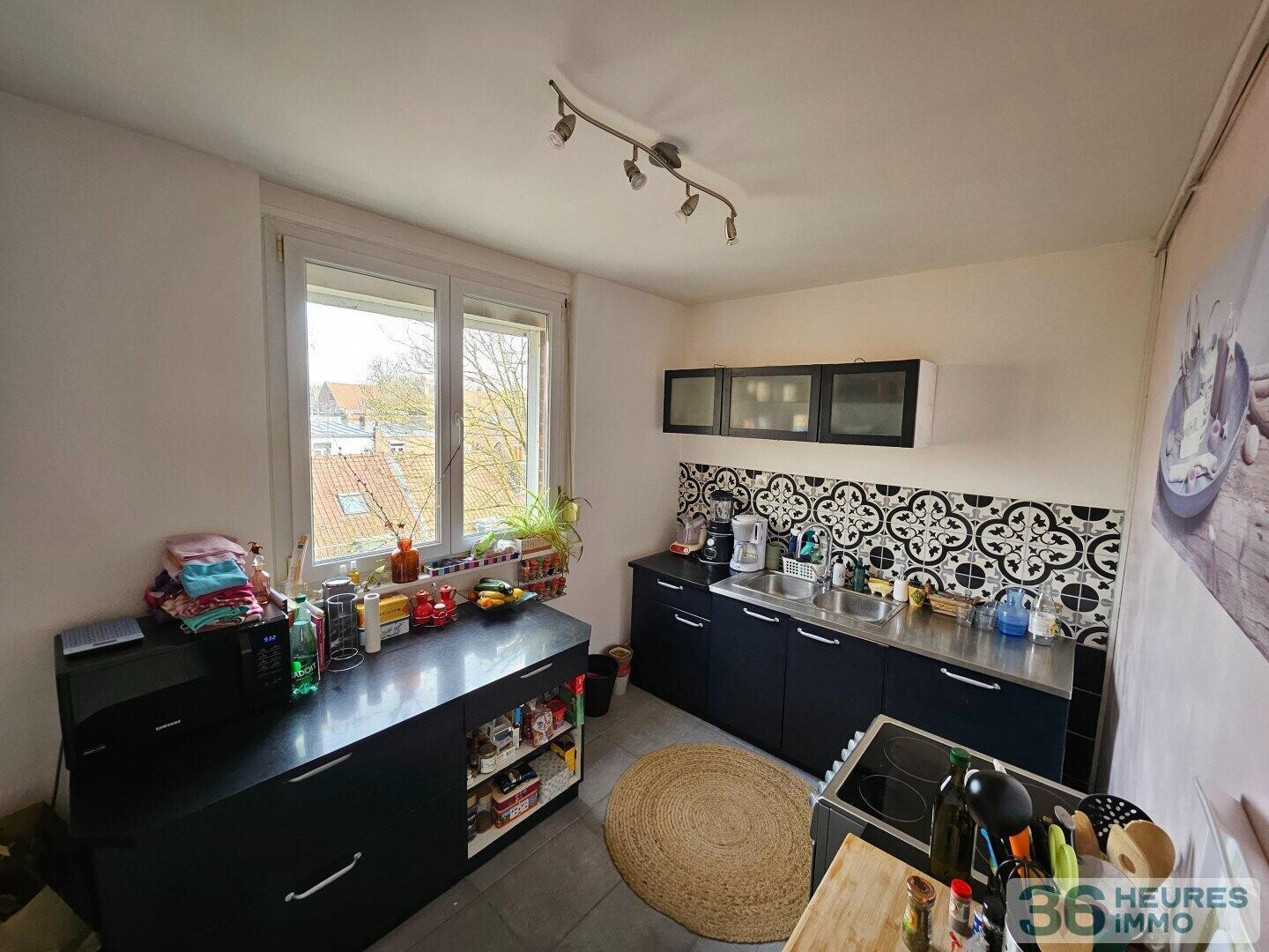 T4 avec Balcon, garage et parking