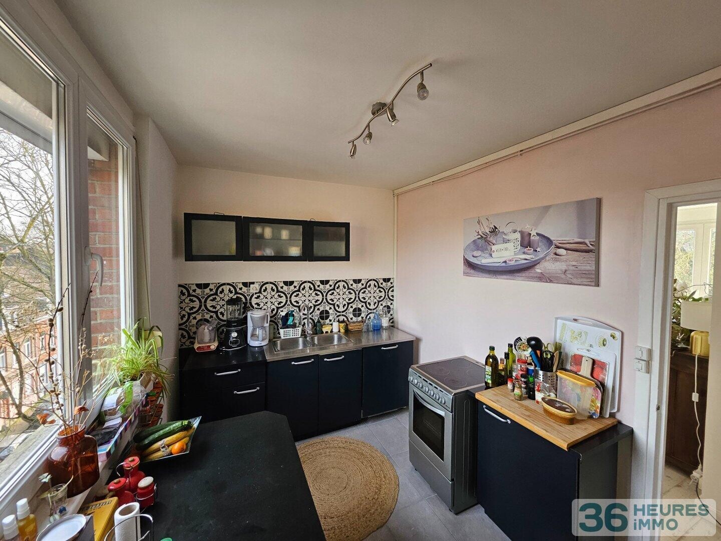 T4 avec Balcon, garage et parking