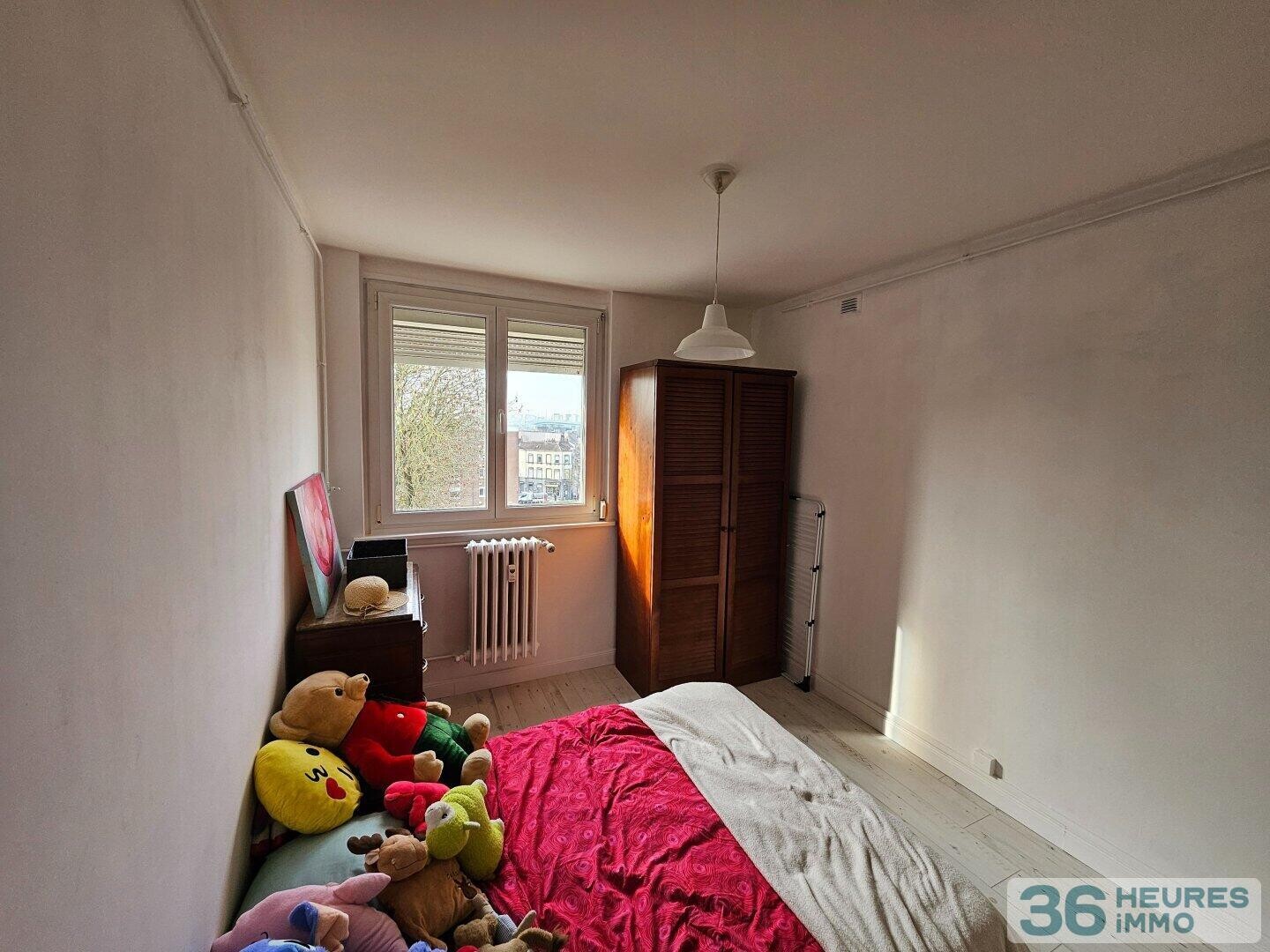 T4 avec Balcon, garage et parking