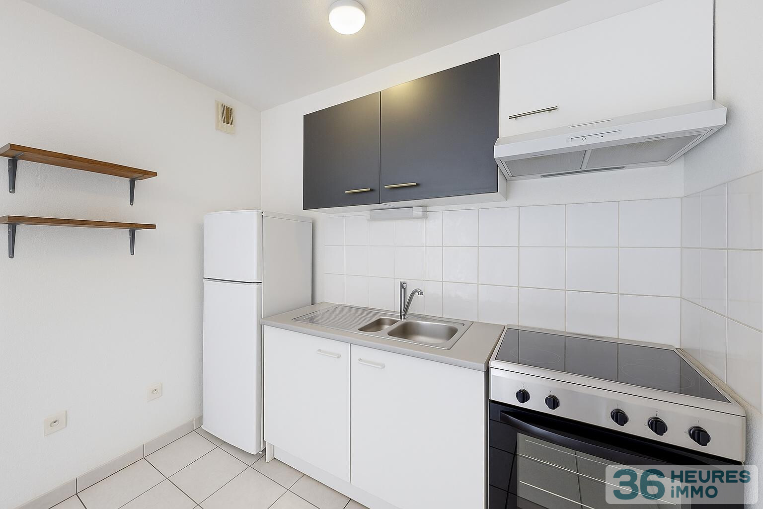 T2 en rez-de-jardin avec place de parking, vendu loué