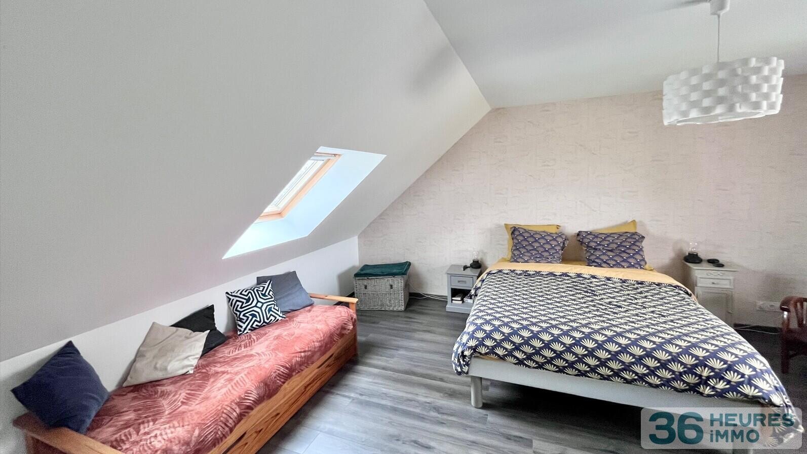 Maison sans vis-à-vis avec 4 grandes chambres et une vie de plain-pied sur un terrain de 1000 M2 avec triple garage et préau à Pontchâteau