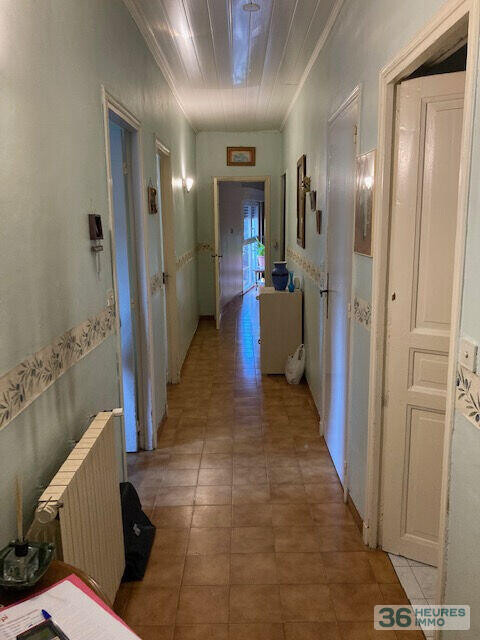 Maison de caractère divisée en deux logements communicants – 173 m²