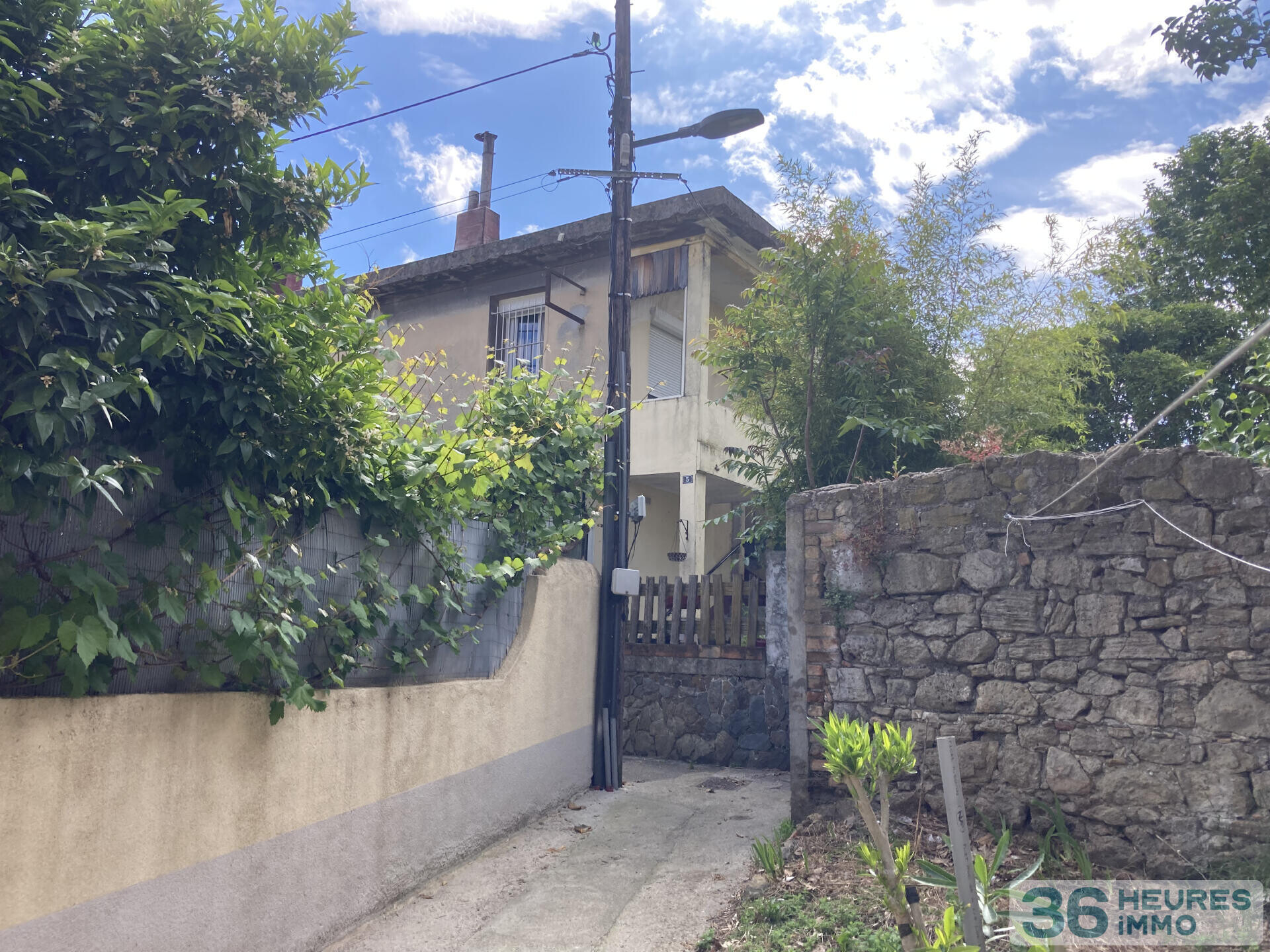 Maison de caractère divisée en deux logements communicants – 173 m²